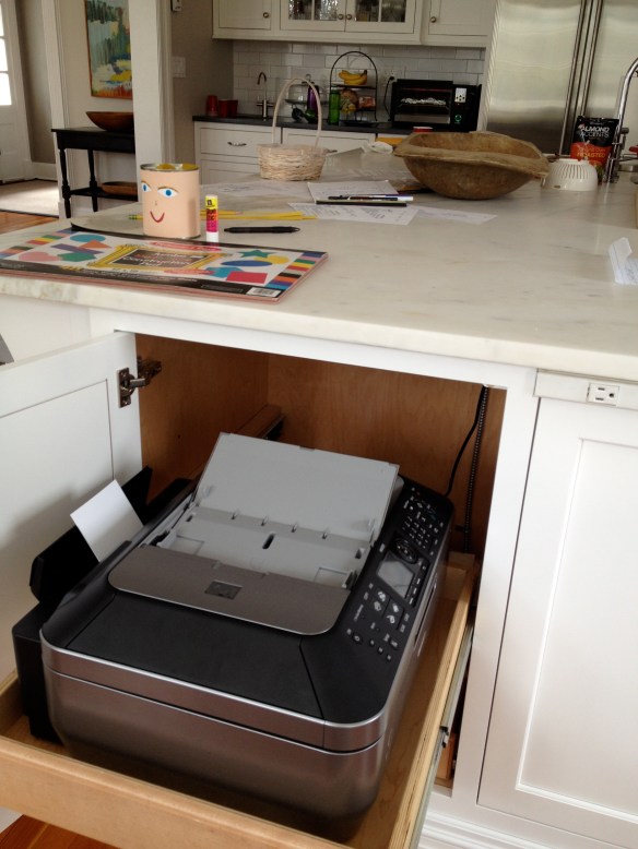 Same trick for the printer. It's nice to have it near homework central, but out of sight when not needed.