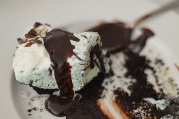 Grasshopper pie with hot fudge sauce