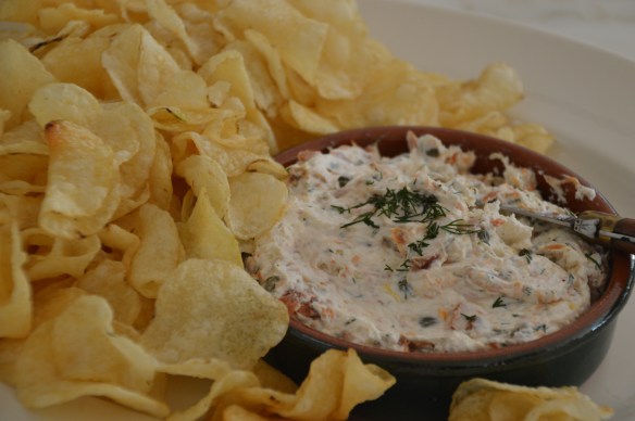 Smoked salmon mixed with whipped cream cheese, fresh dill, lemon zest and capers. Served with thick potato chips for a gluten-free option.