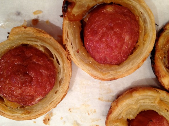 haute dogs: anduilla sausage wrapped in puff pastry.
