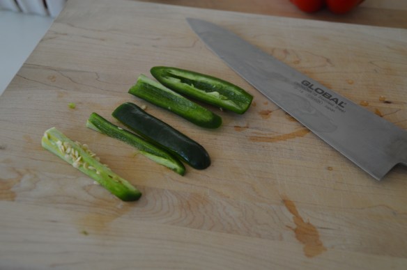 Cut around the core, as with the bell peper.