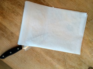 Fold sheets and use a knife to cut into smaller pieces.