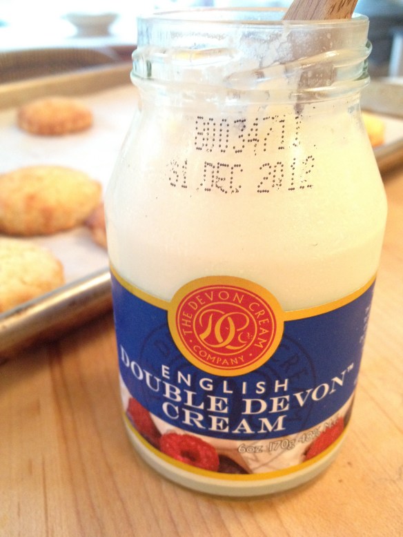English clotted cream is delish on warm scones. (This is an old photo -- I was not using expired cream!)