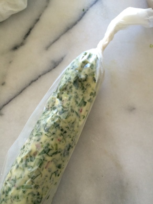 Roll up the parchment sheet and twist the ends Tootsie Roll style.